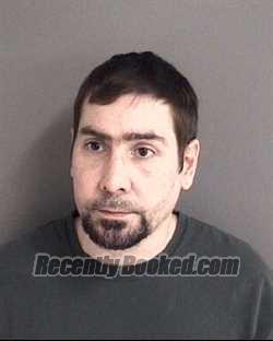 Booking photo from Story County, Iowa