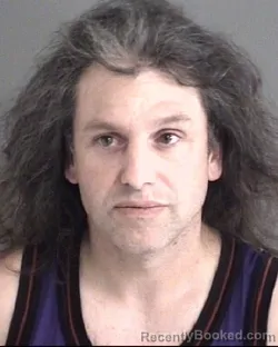 Mugshot of JASON TOBYIS MILLER booked in Story County, Iowa on July 6, 2026