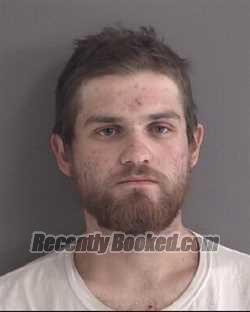 Booking photo from Story County, Iowa