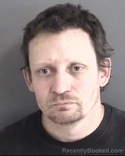 Mugshot of JOSHUA DALE WARREN booked in Story County, Iowa on March 22, 2026