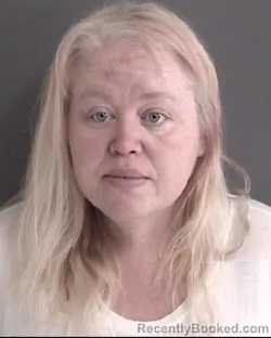 Mugshot of KIMBERLY DAWN WRIGHT booked in Story County, Iowa on March 18, 2026