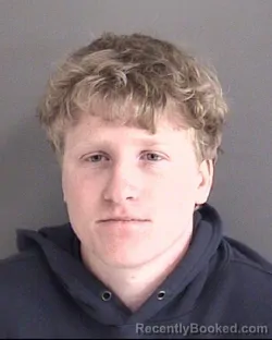 Mugshot of LUCAS EDWARD STOEN booked in Story County, Iowa on March 28, 2026