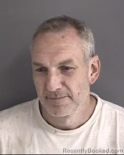 Mugshot of LAURENCE JOHN VER STEEG booked in Story County, Iowa on July 10, 2026