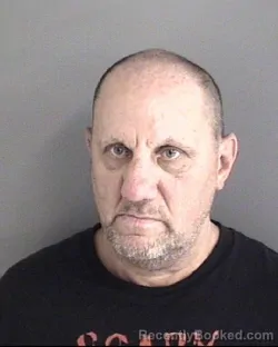 Mugshot of MICHAEL ALLEN DAWSON booked in Story County, Iowa on May 21, 2026