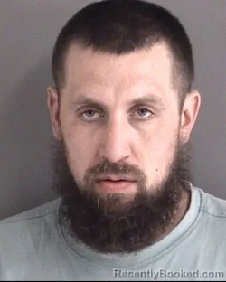 Mugshot of MICHAEL TODD LEE booked in Story County, Iowa on March 24, 2026