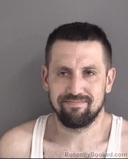 Mugshot of Michael Todd Lee booked in Story County, Iowa on August 6, 2026