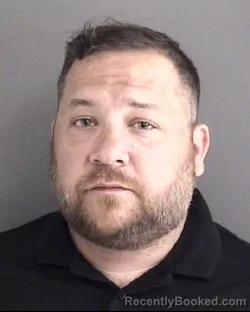 Mugshot of MARCUS ALAN TOWNSEND booked in Story County, Iowa on July 27, 2026