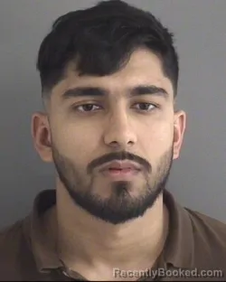 Mugshot of PRITAM PRIYADARSI ACHARYA booked in Story County, Iowa on March 12, 2026