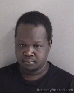 Mugshot of RUAC CHUOL CHOTKUAC booked in Story County, Iowa on March 18, 2026