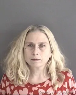 Mugshot of SUSAN JOANNE MUELLER booked in Story County, Iowa on May 12, 2026