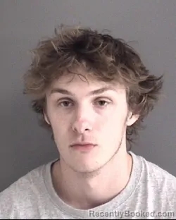 Mugshot of SAMUEL RYAN MCCAULEY booked in Story County, Iowa on April 22, 2026