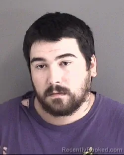 Mugshot of TYLER JAMES DAGUE booked in Story County, Iowa on July 8, 2026