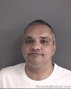 Mugshot of Umair Alam Abbasi booked in Story County, Iowa on October 28, 2026
