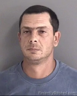 Mugshot of WYNAND KOTZE booked in Story County, Iowa on August 1, 2026