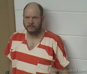 Mugshot of TRAVIS QUINN WAMBOLD booked in Union County, Iowa on March 24, 2026