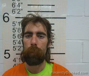 Mugshot of BENJAMIN H KUHNS booked in Warren County, Iowa on July 27, 2026