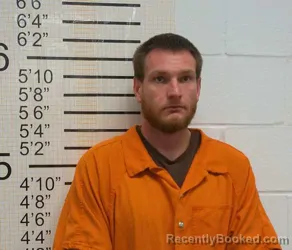 Booking photo from Warren County, Iowa