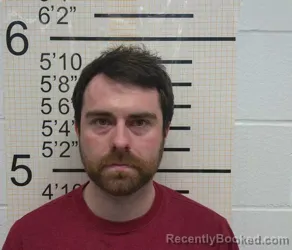 Mugshot of TYLER NATHANIEL JENSEN booked in Warren County, Iowa on March 4, 2026