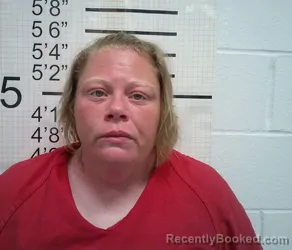 Mugshot of DEVON RAE SCROGGINS booked in Warren County, Iowa on July 27, 2026