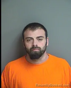 Booking photo from Warren County, Iowa