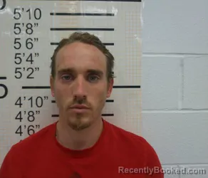 Booking photo from Warren County, Iowa