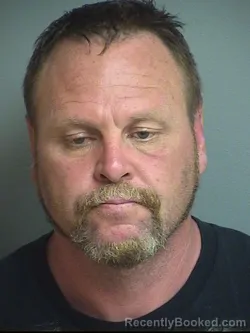 Mugshot of VERLIN CHARLES JR BROWN booked in Warren County, Iowa on March 23, 2026