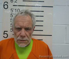 Mugshot of GREGORY EARL LOWE booked in Warren County, Iowa on March 4, 2026