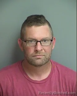 Mugshot of ZACHARY DELVAN CARROLL booked in Warren County, Iowa on March 5, 2026