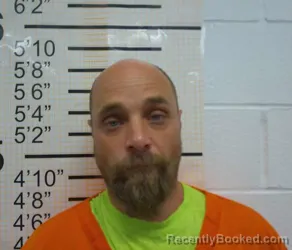 Mugshot of RUSTY LEE CURTIS LEWIS booked in Warren County, Iowa on July 13, 2026