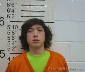 Booking photo from Warren County, Iowa