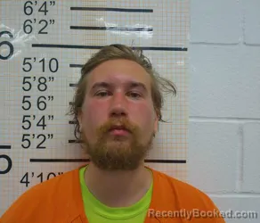 Mugshot of KALEB MICHAEL REHA booked in Warren County, Iowa on May 22, 2026