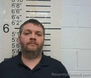 Mugshot of ROBERT LEE BOOZELL booked in Warren County, Iowa on March 19, 2026