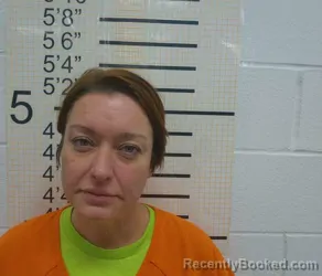 Mugshot of JENNIFER ANN HARTNETT booked in Warren County, Iowa on March 18, 2026