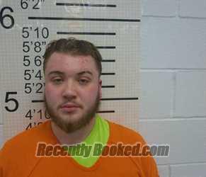 Booking photo from Warren County, Iowa