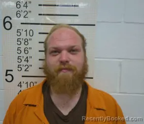 Booking photo from Warren County, Iowa