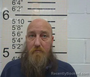 Mugshot of JASON CRAIG ROLLINS booked in Warren County, Iowa on March 20, 2026