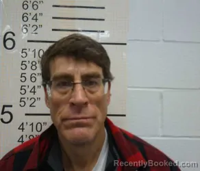 Booking photo from Warren County, Iowa