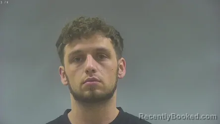 Mugshot of TAYLOR AUSTIN STOUT booked in Washington County, Iowa on June 12, 2026