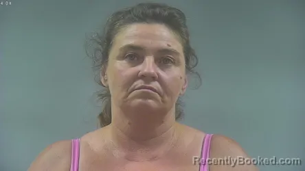Mugshot of CYNTHIA ANN WOOLDRIDGE booked in Washington County, Iowa on June 13, 2026