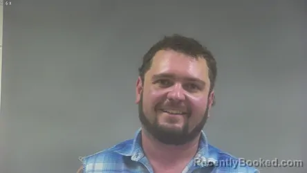 Mugshot of JORDAN THOMAS BROWN booked in Washington County, Iowa on August 4, 2026