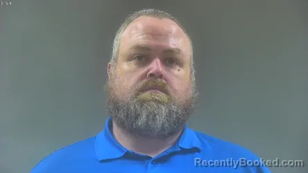Mugshot of JOSHUA CHASTAIN COATES booked in Washington County, Iowa on June 19, 2026