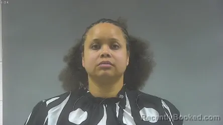 Mugshot of KARI MAKALA HEUSINKVELD booked in Washington County, Iowa on April 24, 2026