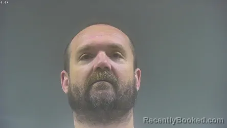 Mugshot of DUSTIN WAYNE STUCKER booked in Washington County, Iowa on April 2, 2026