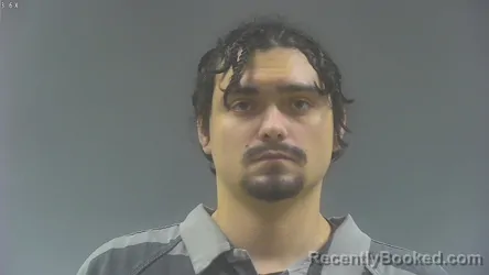 Mugshot of ALEJANDRO FELIPE MORENO-NEER booked in Washington County, Iowa on March 23, 2026