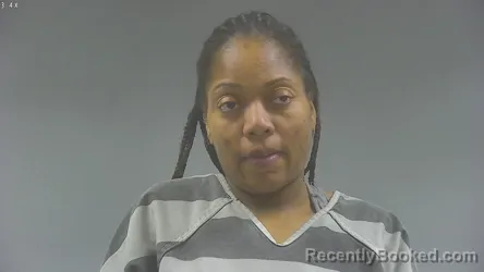 Mugshot of KEMI KATYANE DRINK booked in Washington County, Iowa on May 10, 2026