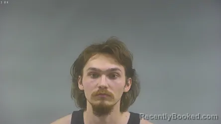 Mugshot of Aidan Christopher Burroughs booked in Washington County, Iowa on August 30, 2026