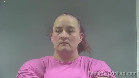 Mugshot of AMY SUE WAGG booked in Washington County, Iowa on April 14, 2026