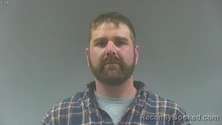 Mugshot of JUSTIN JAMES SCHRADER booked in Washington County, Iowa on March 21, 2026