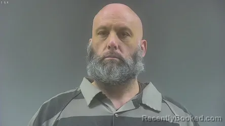 Mugshot of JOSHUA MICHAEL GUSTAFSON booked in Washington County, Iowa on March 23, 2026