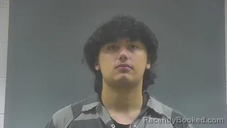 Mugshot of MARIO JAMES SIMMONS HARTLEY booked in Washington County, Iowa on March 30, 2026